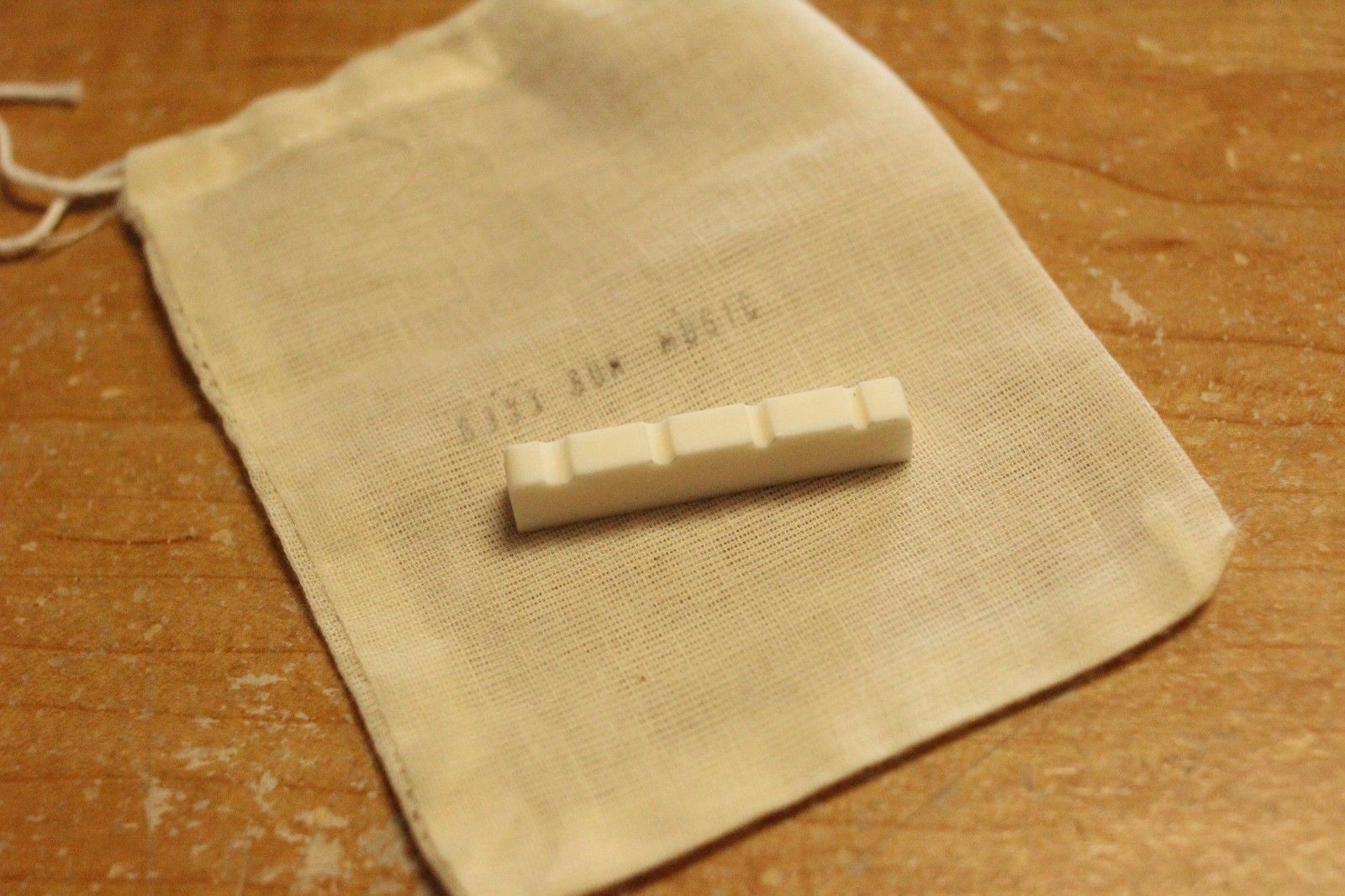 SGM slotted bone nut for 4-string electric bass